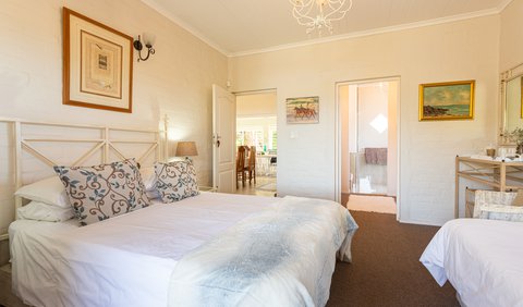 Deluxe Garden Room (Queen + Single): Spacious Garden room room with private entrance, dressing room and private bathroom.