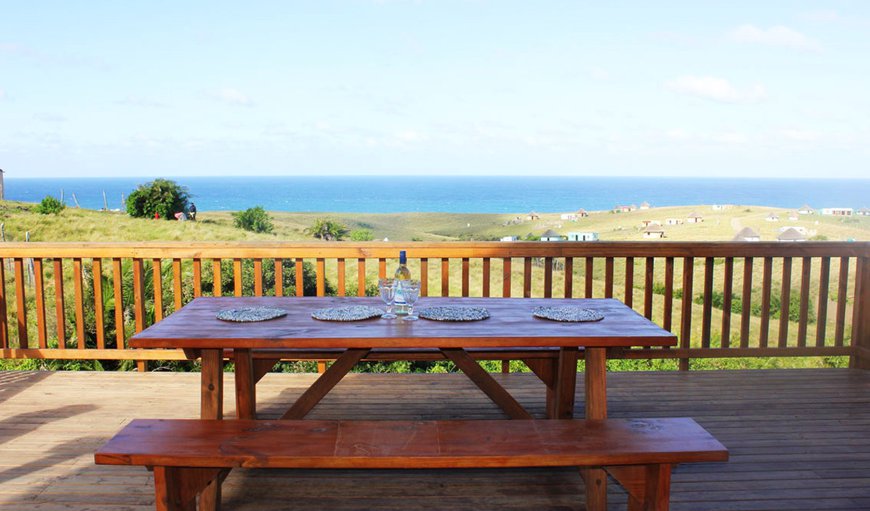 Luxury Honeymoon/ Family Rondavels - large deck to relax on with incredible view of the ocean and surrounding landscape. Luxury Honeymoon/ Family Rondavels - large deck to relax on with incredible view of the ocean and surrounding landscape.