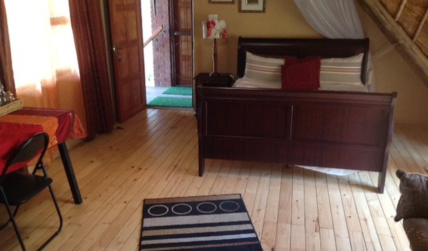 Ensuite Room: En-suite bedroom with double bed, separate entrance and mini bar fridge.