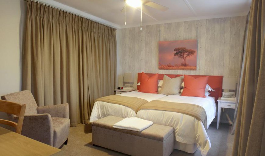 Room 8 Acacia: The Acacia Room has 2 single beds which can be converted into a King-sized bed