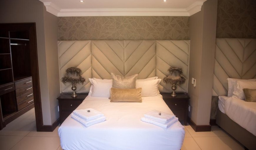 The deluxe room is a beautiful garden room with a private entrance and sitting area outside. This room offers a Queen size bed with an extra single bed. The en-suite bathroom boasts a walk in closet, and a big walk in shower. You can be assured to feel at home. The deluxe room is a beautiful garden room with a private entrance and sitting area outside. This room offers a Queen size bed with an extra single bed. The en-suite bathroom boasts a walk in closet, and a big walk in shower. You can be assured to feel at home.