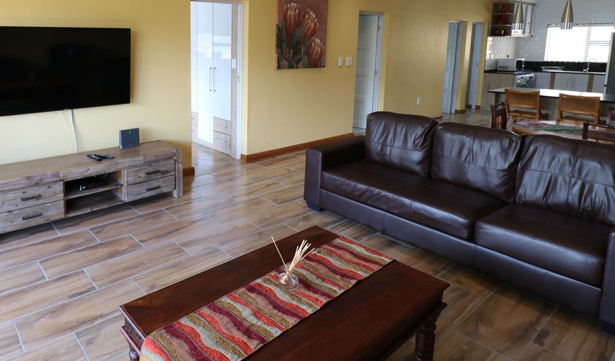 Glen Heights One - The lounge area is tastefully furnished with comfortable couches and a TV