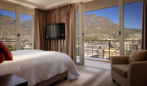 Deluxe Studio: A comfortable, open plan Studio Suite with a small sitting area. Some Deluxe Studios have balconies overlooking Table Mountain, Signal Hill, the city or Table Bay.
