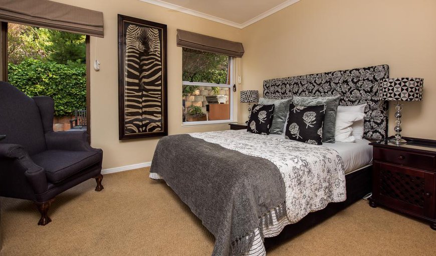 Mountain Facing Double Room - Each bedroom leads out to the mountain garden and contains a flat screen TV and an en-suite bathroom. Mountain Facing Double Room - Each bedroom leads out to the mountain garden and contains a flat screen TV and an en-suite bathroom.