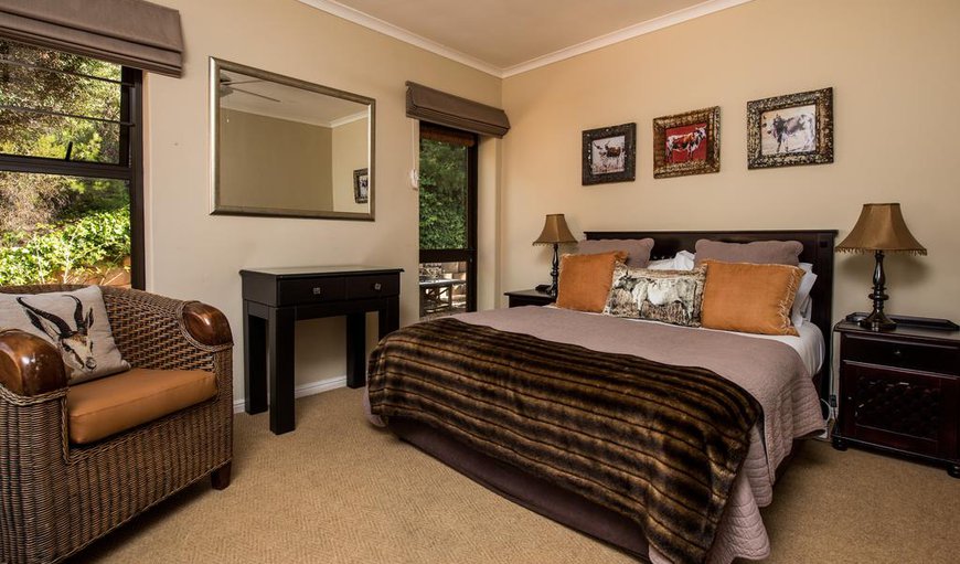 Mountain Facing Double Room - Each bedroom leads out to the mountain garden and contains a flat screen TV and an en-suite bathroom. Mountain Facing Double Room - Each bedroom leads out to the mountain garden and contains a flat screen TV and an en-suite bathroom.