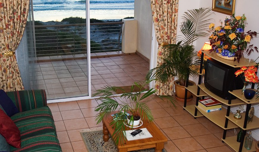 Top Floor,  Sea Facing: Lounge leads onto Sea facing balcony
