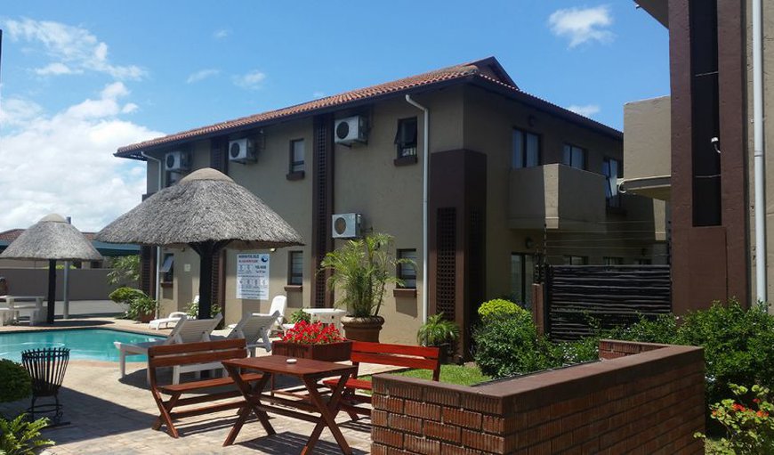 Swimming Pool area with Braai facilities and lovely gardens.