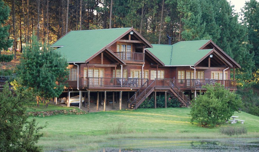 The Lodge: Wrap deck balcony with outdoor table & chairs.