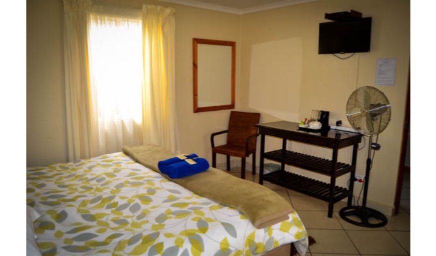 Standard Queen Room: Standard Queen Room- All our rooms are en-suite with coffee facilities and selected Dstv channels.