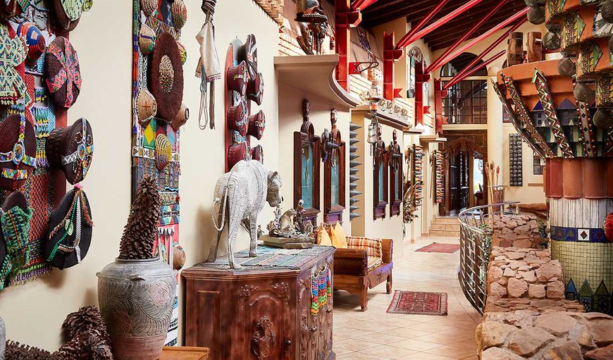 Experience a special stay in the elaborately crafted and decorated walkways, halls and bedrooms using beadwork and African art, artifacts and statues, specifically covering the Zulu Culture. Experience a special stay in the elaborately crafted and decorated walkways, halls and bedrooms using beadwork and African art, artifacts and statues, specifically covering the Zulu Culture.