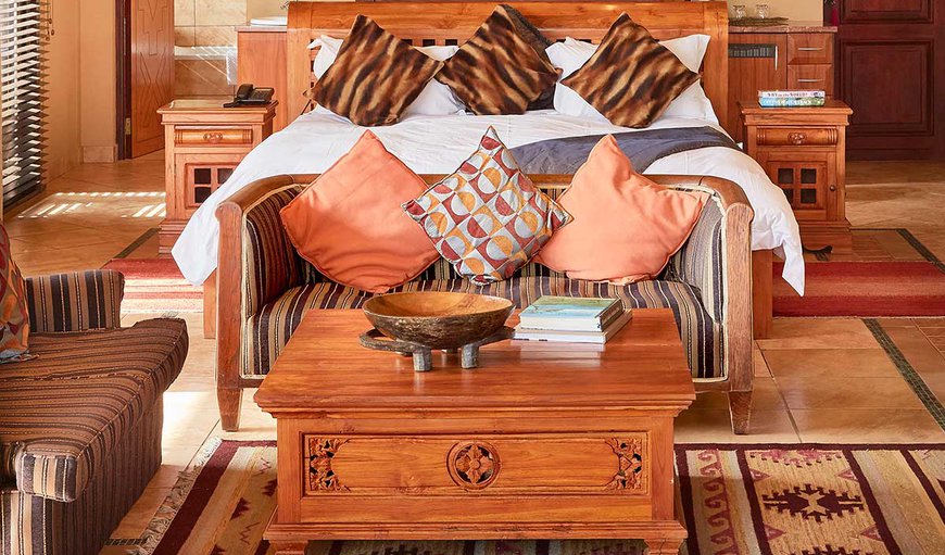 Presidential Suite: Presidential Suite: Suites are decorated with original African art works and beaded panels, extending even into the large en-suite bathrooms.
