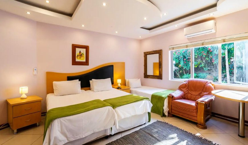 Bedroom 1- All rooms have air-conditioning, a TV with a selection of DStv channels & contain single beds which can be made up into double beds on request. Bedroom 1- All rooms have air-conditioning, a TV with a selection of DStv channels & contain single beds which can be made up into double beds on request.