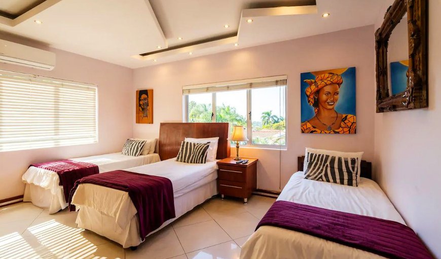 Bedroom 3- All rooms have air-conditioning, a TV with a selection of DStv channels & contain single beds which can be made up into double beds on request. Bedroom 3- All rooms have air-conditioning, a TV with a selection of DStv channels & contain single beds which can be made up into double beds on request.