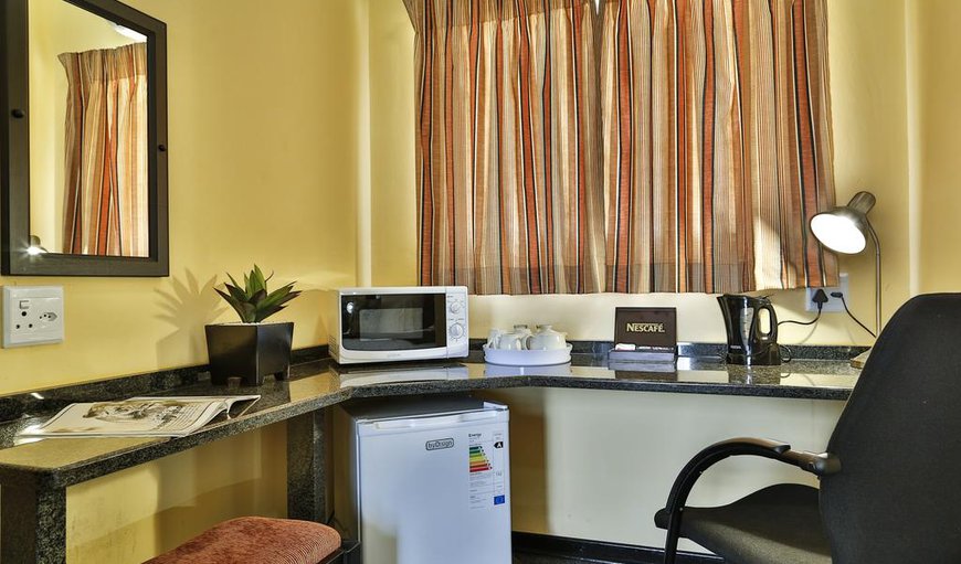 IDube Business Studio: The 16 iDube business studios are well designed with a work desk, desk lamp, WiFi, DSTV and tea/coffee station.
