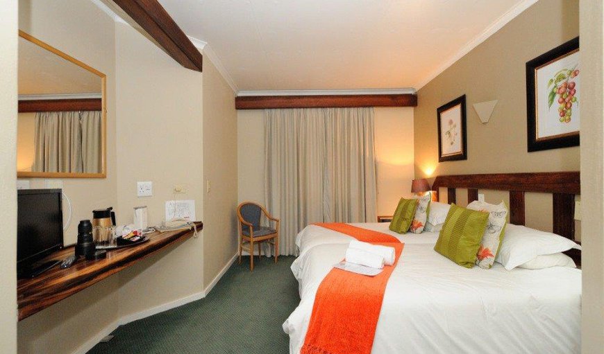 Twin Rooms: 2x ¾ beds, Mini fridge, flat screen television with hotel bouquet channels, air-conditioned with en-suite bathroom with shower. Coffee and tea station with room amenities