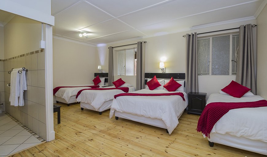 Deluxe Quadruple Room: Deluxe Quadruple Room- Onne double and three single beds with en-suite bathroom.