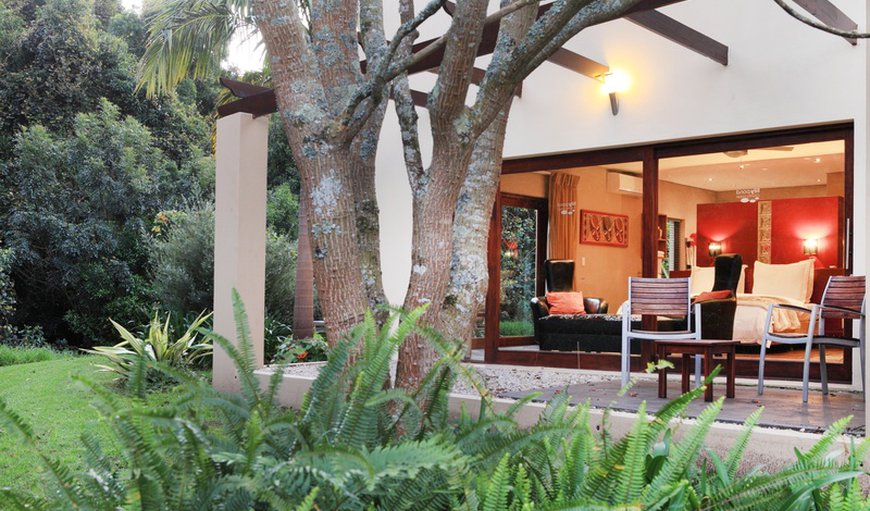 Superior-Honeymoon Suite: Honeymoon Suite with chairs on the patio.