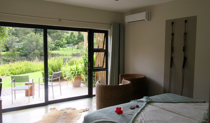 Garden Room: Garden En Suite Room with a double bed and a patio.