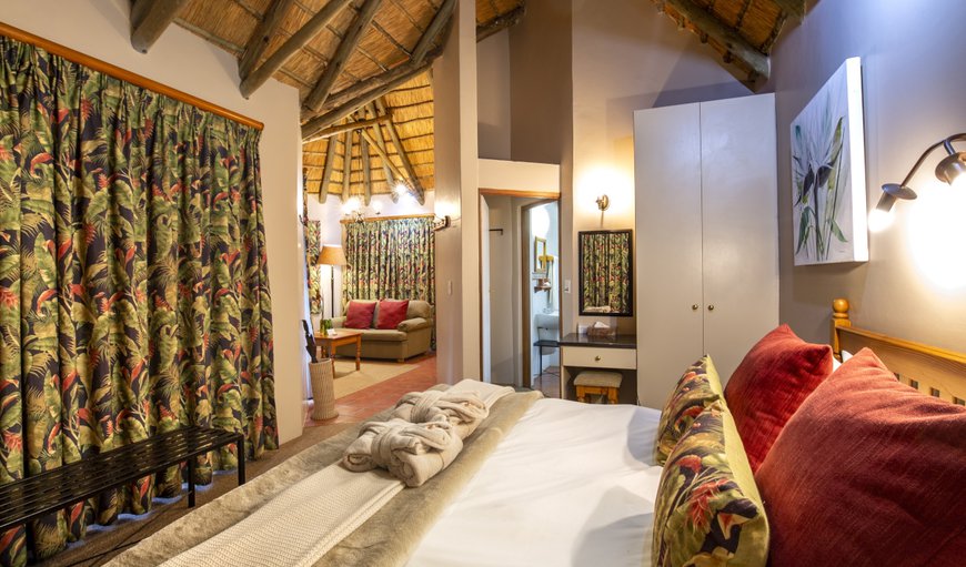 Garden Suites: bedroom with en-suite bathroom (bath and walk-in shower), a lounge with TV, DVD player and a gas operated fireplace. Garden Suites: bedroom with en-suite bathroom (bath and walk-in shower), a lounge with TV, DVD player and a gas operated fireplace.
