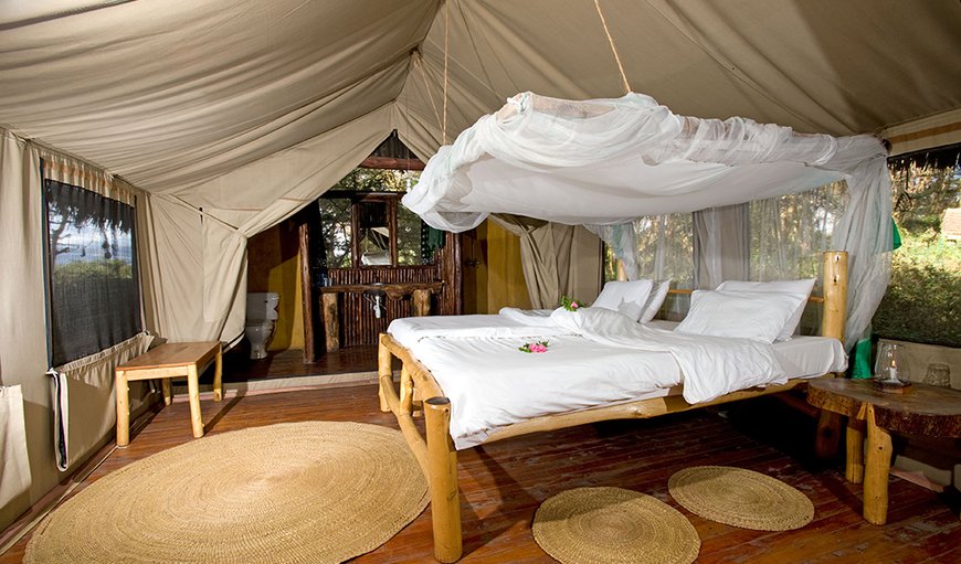 Semi Luxury Tents: Bedroom suite has a luxurious finish feel with cozy living quarters