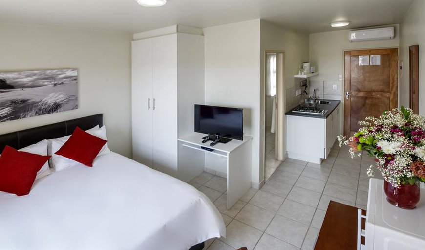 Wheelchair Friendly Double Rooms: Each room contains either a double bed or twin single beds, an en-suite bathroom, a TV with DStv, tea and coffee-making facilities and air-conditioning.