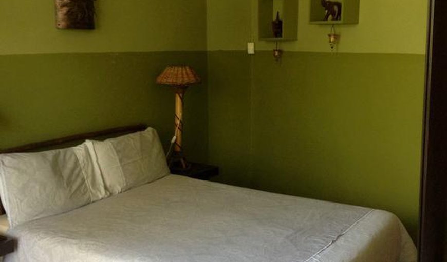 Double Room (African): Double Room (African) - This bedroom is comfortably furnished with a double bed and shares a bathroom.