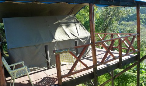 Safari Tent Double (Mountain View): Safari Tent - This tent features a deck with beautiful views and shares a bathroom and kitchen.