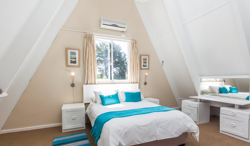 Beach you to it - self catering holiday home: Upstairs Main bedroom with air conditioner
