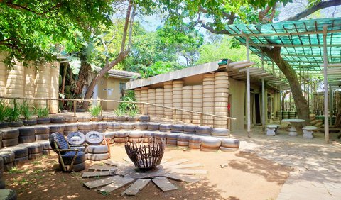 Eco Dormitory Unit: Outdoor firepit and eating area