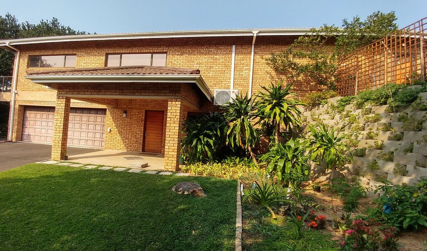 This spacious holiday home offers four bedrooms with two lock up garages with open, off-street parking for additional cars.