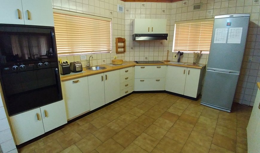 There is a kitchen for your convenience, fitted with a fridge, stove, cutlery and just about anything else you may need to help you prepare a delicious meal There is a kitchen for your convenience, fitted with a fridge, stove, cutlery and just about anything else you may need to help you prepare a delicious meal