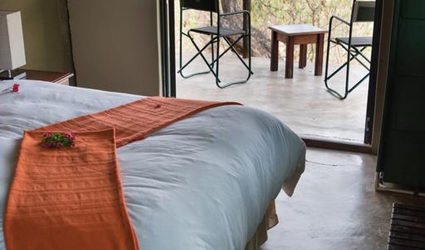 Safari Style Tent: Safari Tent Bedroom with Outside Seating Area