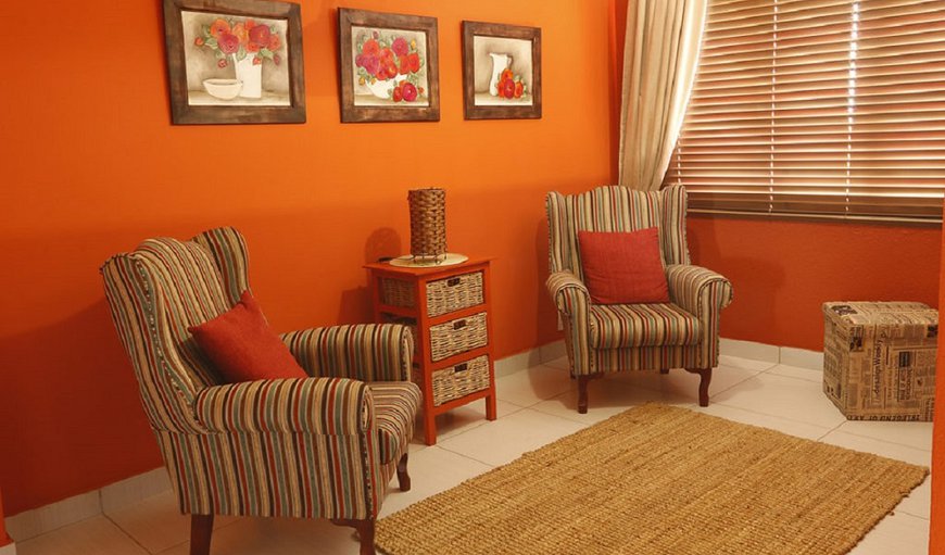 Room 11.Joyful Shades of Orange: Room 11 - Sitting Area