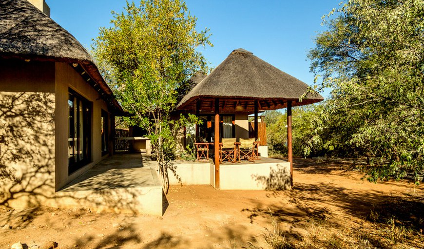 Exterior with a patio and seating area