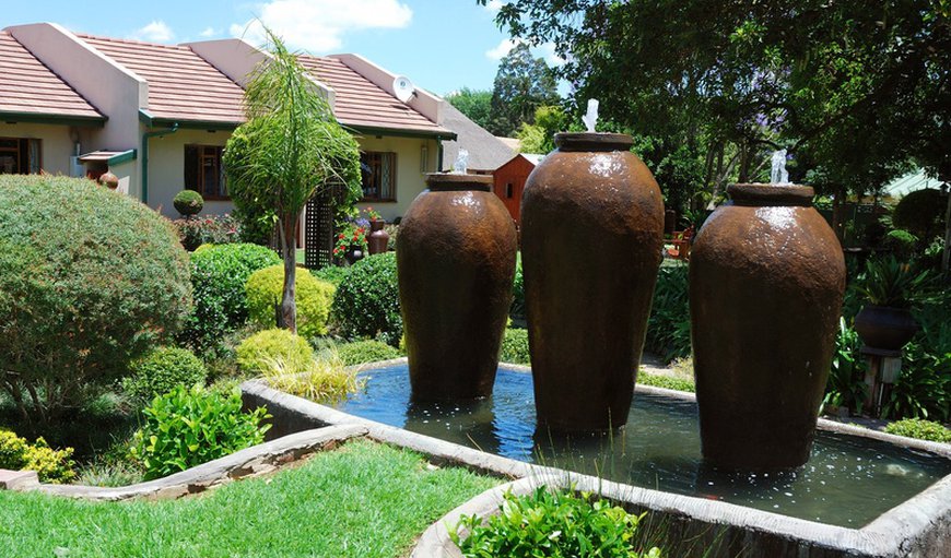 Garden with beautiful water feature 