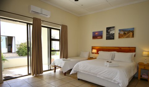 Room 5 - Family Suite: Room 5 - Very spacious queen suite, with two single beds. Bathroom en-suite with a shower.