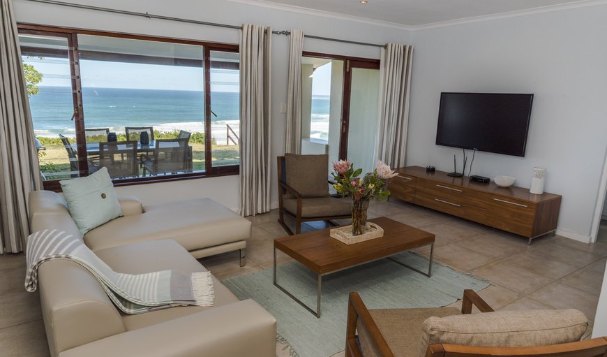 Ocean Front 2 Bedroom Villa: Modern Lounge with Flat Screen TV
