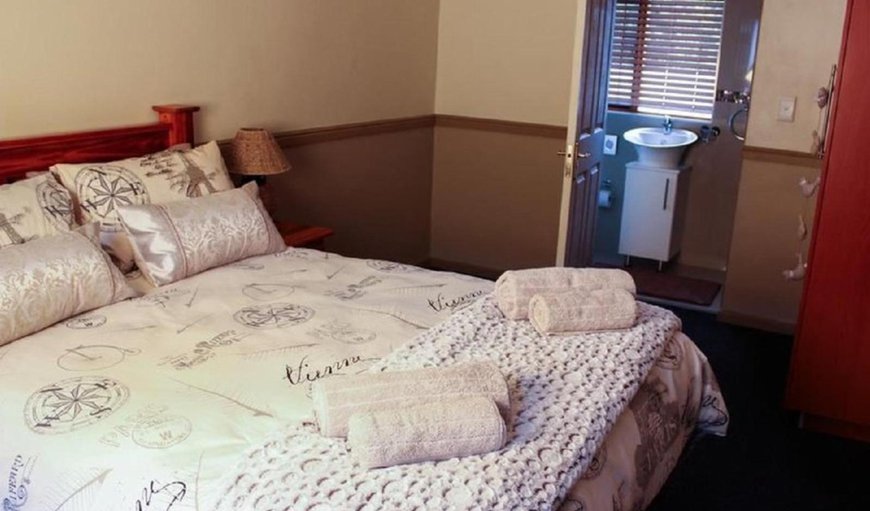 Cozy Rooms (Double beds): Cozy Rooms (Double beds) - Bedroom with a double bed