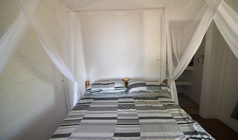 Double Family Cabin: Bedroom with Double Bed, en suite Batroom (Bath) and Air Conditioned.
