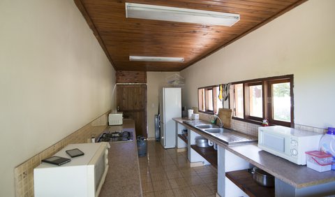 Rooms/Backpackers/Overflow: Communal Kitchen for Rooms 1 to 4 and Camping Sites, equipped with Fridges, Freezer, Microwaves, Toaster, Cutlery, etc.