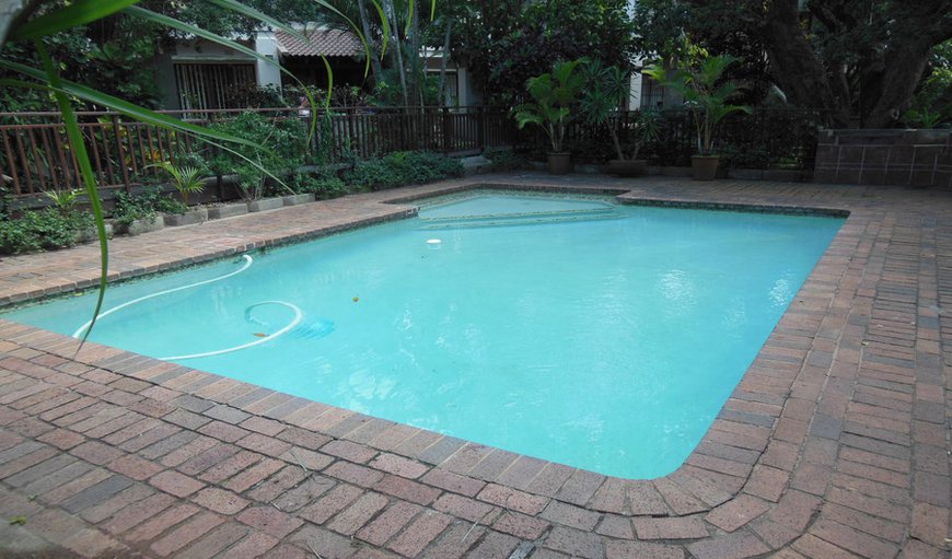 The pool is in front of the unit, whilst fenced and gated, it is not netted.