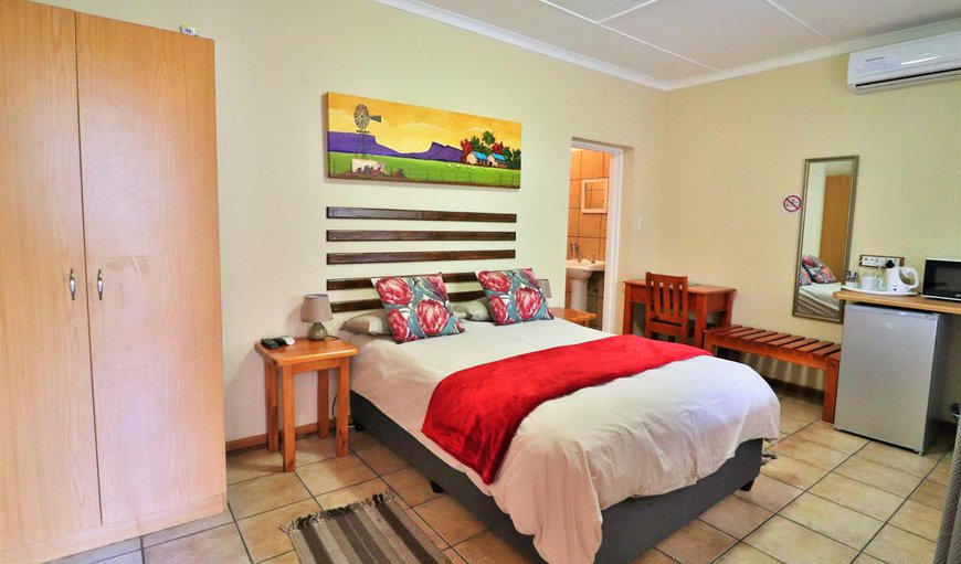 Double Room: Double Room - This room is furnished with a double bed, TV with DSTV, a bar fridge, microwave and tea/coffee making facilities.