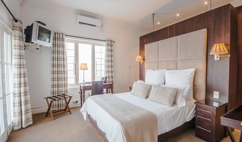 Queen Room: Room 1 - Executive Room equipped with fridge, safe, coffee and tea, air conditioning and TV.