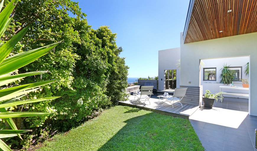 Villa Aqua is a four bedroom villa situated in Camps Bay featuring a terrace with a pool.