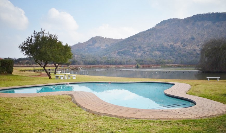 Swimming pool at communal entertainment area overlooking the Crocodile river. in Hartbeespoort Dam, Hartbeespoort, North West Province, South Africa