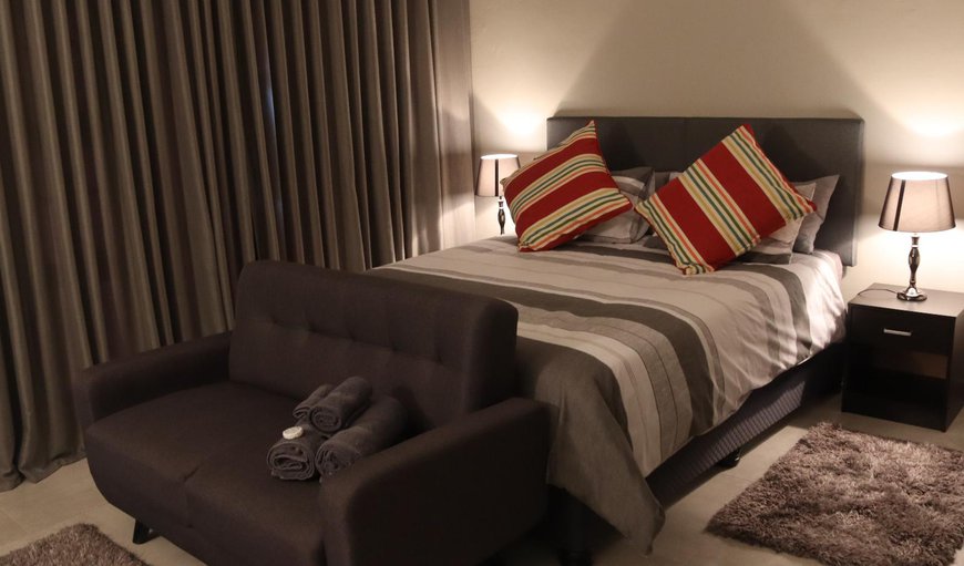 Deluxe Room: Deluxe Room - Bedroom with a queen size bed
