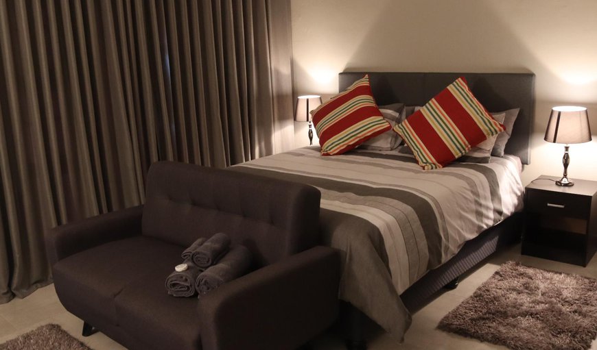 Deluxe Room: Deluxe Room - Bedroom with a queen size bed