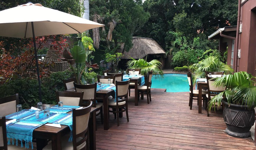 Outdoor pool and dining area