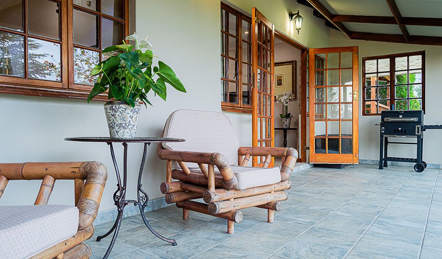 White Egret Cottage - Enjoy the private veranda with views of our beautiful valley and the Drakensberg mountains. White Egret Cottage - Enjoy the private veranda with views of our beautiful valley and the Drakensberg mountains.