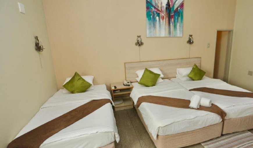 Triple Room: Triple Room - Bedroom with 3 single beds